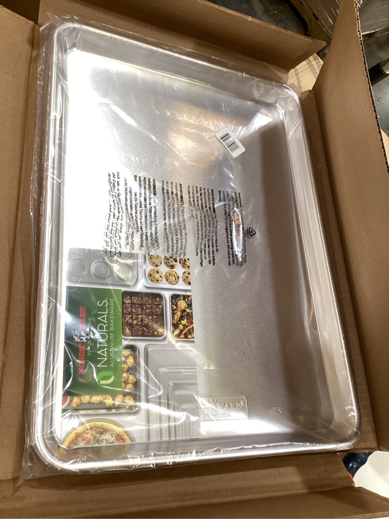 Condition photo showing New/Like New for nordic ware naturals half sheet - usa made aluminum commercial quality sheet pan for baking or roasting, encapsulated galvanized steel rim prevents warping, 2-pack 2pk half sheet