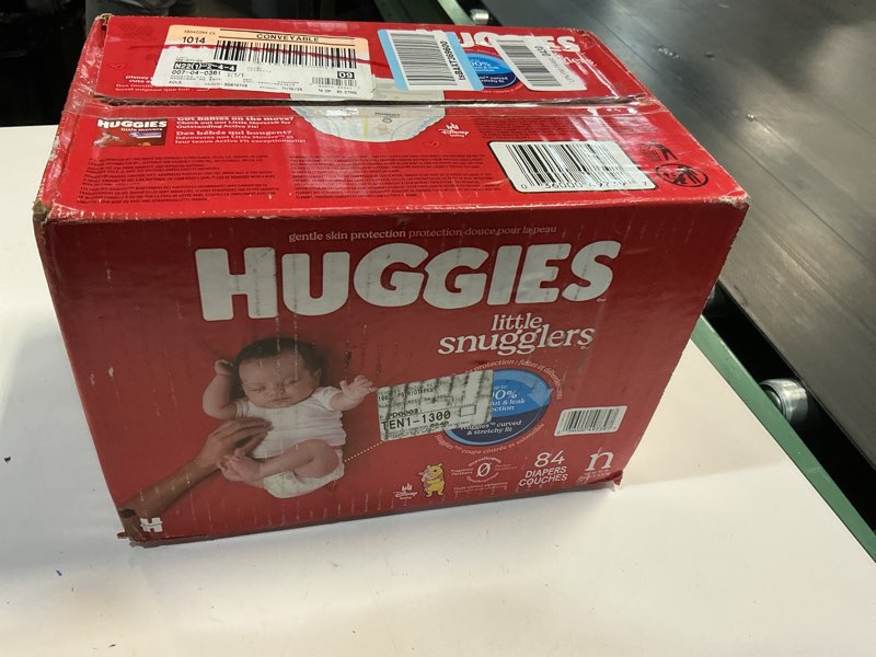 Condition photo showing New/Like New for Huggies Little Snugglers Diapers - Newborn - 84ct