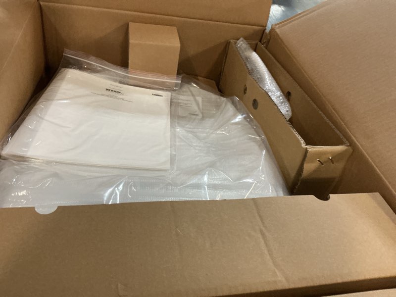 Condition photo showing New/Like New for kohler purewash e590 elongated heated bidet toilet seat, white with side panel, warm water, dryer, quiet-close lid, self-cleaning wand, adjustable water pressure and nightlight, easy installation with side panel white