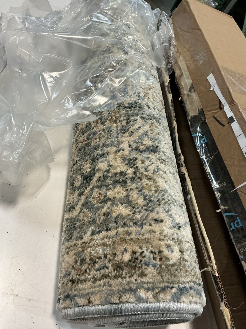 Condition photo showing Good Condition for loloi magnolia home by joanna gaines junie collection jue-01 blue/natural 2'-0" x 3'-0", .38" pile height, accent rug blue / natural 1' x 3' (rectangular)