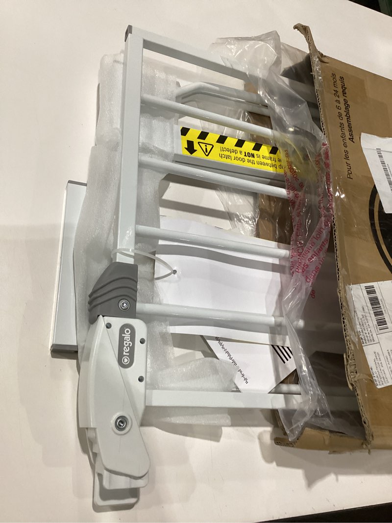 Condition photo showing As Is for regalo safety 29-38.5\" baby gate for doorways & bottom of stairs, pressure mounted baby gate with door for babies, toddlers & pets, tested & safe for 30 years, american designed, american owned, white white 29-38.5\"w x 30\"h, incomplete
