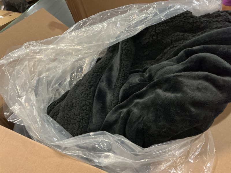Condition photo showing New/Like New for Amazon Basics Soft Fleece Throw Blanket, Lightweight Cozy Blanket for Couch & Sofa In Black