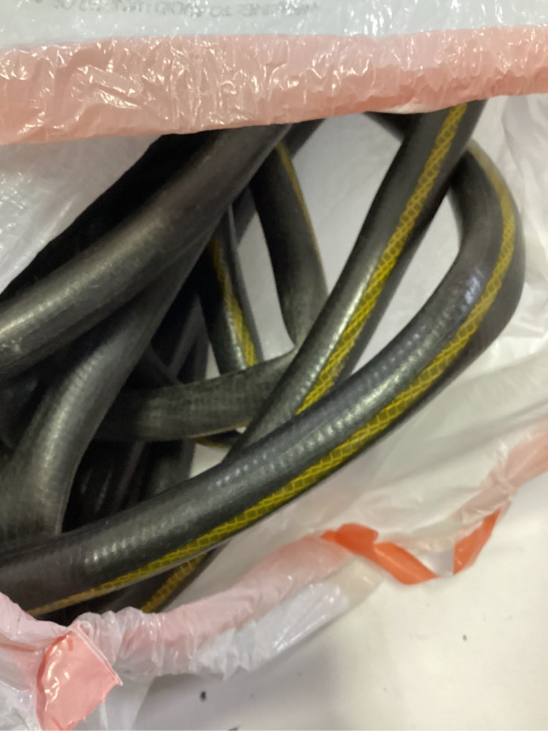 Condition photo showing As Is for black and yellow hose