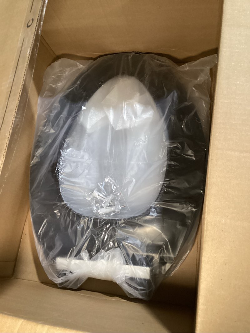 Condition photo showing As Is for (simular to) renovators supply manufacturing black plastic soft close elongated toilet seat quiet-close lid, contoured seat easy to install and clean, grip-tight bumpers with adjustable mounting hardware
