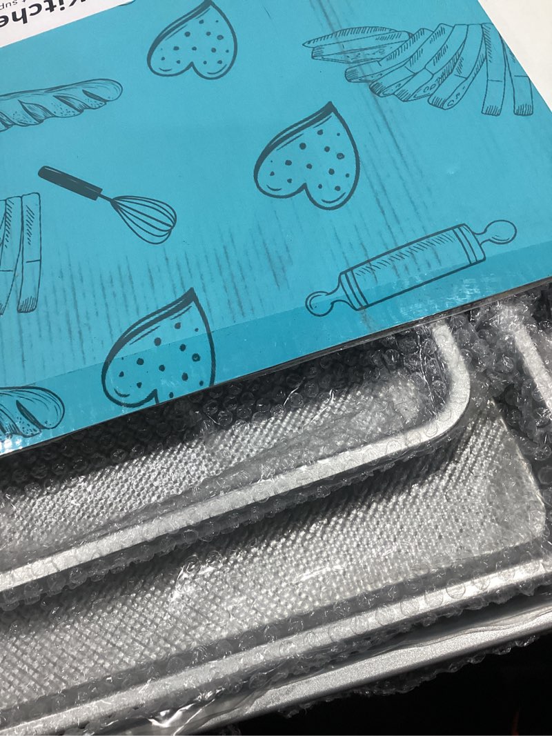 Condition photo showing New/Like New for 3-piece non-stick baking sheet set | pfoa/pfos/ptfe-free, 0.8mm heavy-duty steel with diamond texture surface | stackable design for roasting, baking & toasting silver