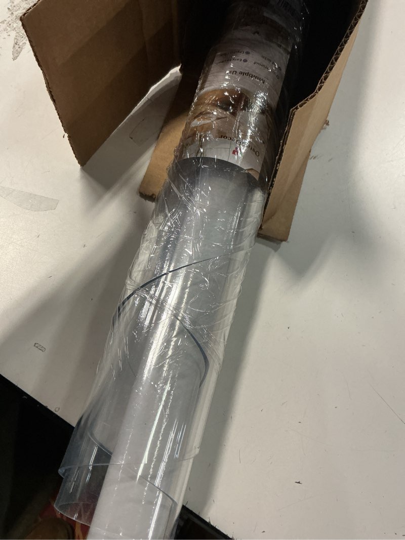 Condition photo showing Good Condition for OstepDecor Clear Round Table Protector 47 Inch Thick Clear Table Cover Protector Round, Plastic Waterproof PVC Tablecloth, Vinyl Circle Table Top Protector for Dining Room, Coffee Tabletop 47" (Round) Round Clear