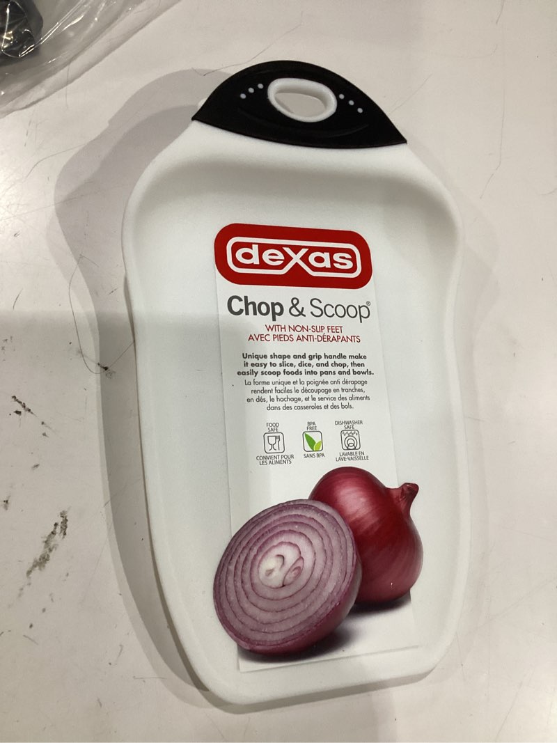 Condition photo showing New/Like New for dexas chop & scoop cutting board with non-slip feet, 6.5 x 10.5 inch, bpa-free dishwasher safe kitchen prep board, white and black white 10.5"l x 6.5"w