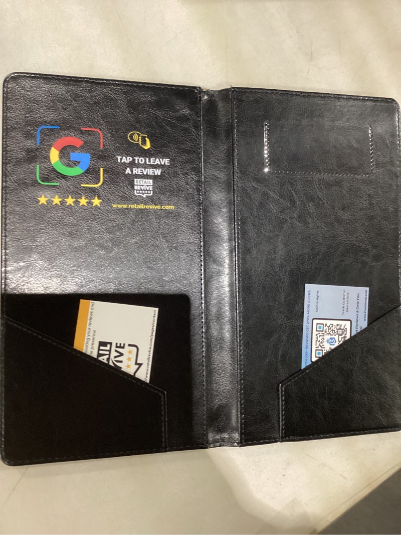 Condition photo showing New/Like New for Retail Revive NFC Tap Check Holder, Black Leather Bill Presenter, Contactless Smartphone Tap, Compat