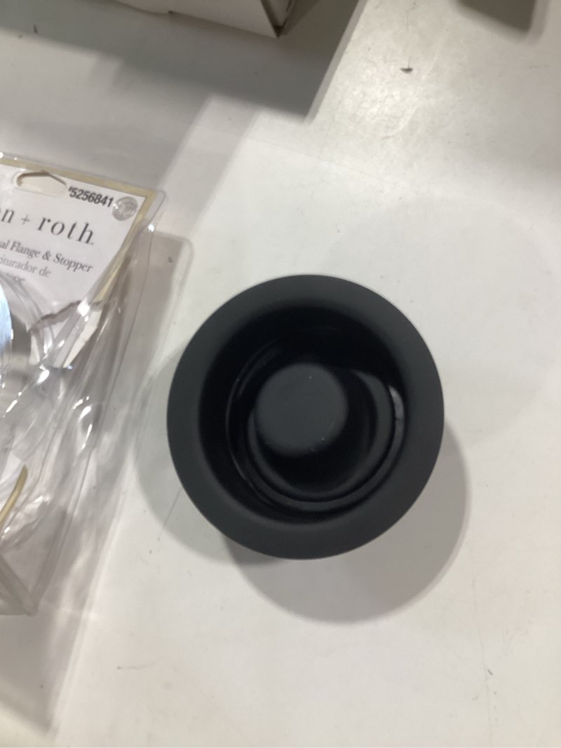 Condition photo showing Good Condition for allen + roth 4.5-in black steel garbage disposal sink flange