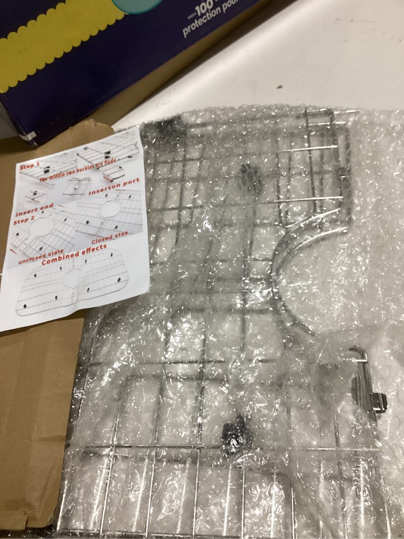Condition photo showing Good Condition for serene valley sink bottom grid 24-1/8" x 12-5/8", centered drain with corner radius 1-1/2", sink protector nlw2412c