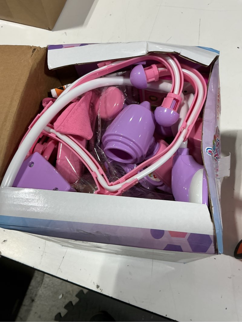 Condition photo showing Good Condition for meland toy doctor kit for girls, pretend play toy doctor set with dog , carrying bag, stethoscope & dress up costume gift for kids toddlers ages 3 4 5 6 year old for role play pink with doll
