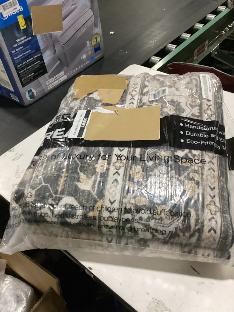 Condition photo showing New/Like New for unique loom sialk hill collection area rug - washington (8' x 10' rectangle black/gray) 8' x 10' (rectangular) black/gray