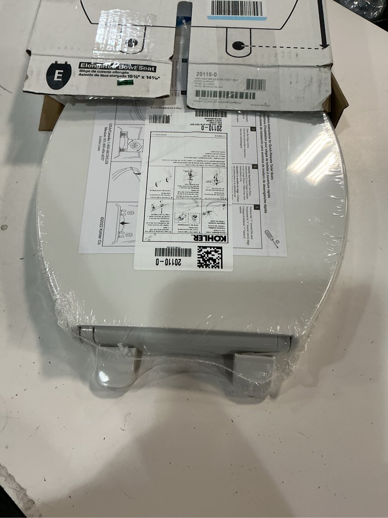 Condition photo showing New/Like New for kohler k-20110-0 brevia elongated toilet seat with grip-tight bumpers, quiet-close seat, quick-attach hardware, white