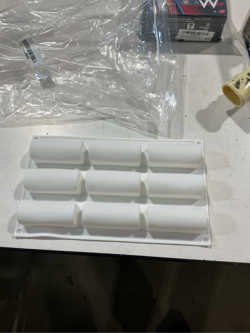 Condition photo showing Good Condition for 9 cavities silicone roll mold, reusable nonstick log shape baking mold for mini swiss rolls, chocolate desserts, twinkie, candy and pastries, flexible easy release, for summer brunch and fun parties