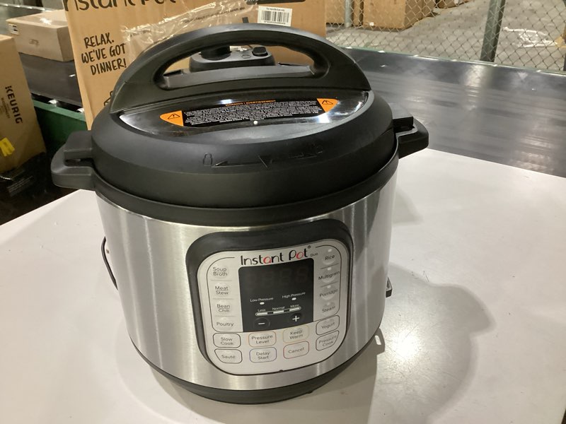 Condition photo showing As Is for **has been used**instant pot duo 7-in-1 electric pressure cooker, slow cooker, rice, steamer, sauté, yogurt maker, warmer & sterilizer, includes app with over 800 recipes, stainless steel, 6 quart 6 quarts