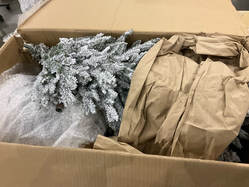 Puleo International 6ft Pre-Lit Potted Flocked Arctic Fir Pencil Christmas Tree with 120 Warm White 