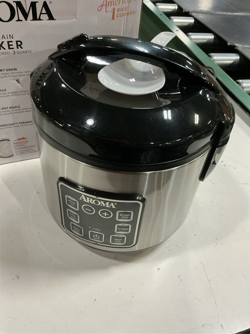 Condition photo showing Good Condition for aroma digital rice cooker, 4-cup (uncooked) / 8-cup (cooked), steamer, grain cooker, multicooker, 2 qt, stainless steel exterior, arc-914sbd 4 cup uncooked / 8 cup cooked