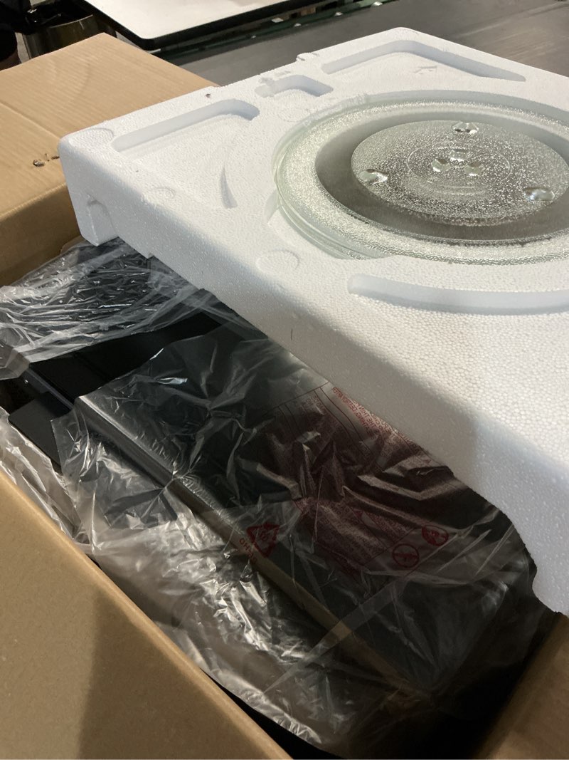 Condition photo showing Good Condition for ge gcst10a1wss 1.0 cu ft convection microwave oven, 1050w countertop air fry microwave with broil & crisper pan, compact stainless steel design