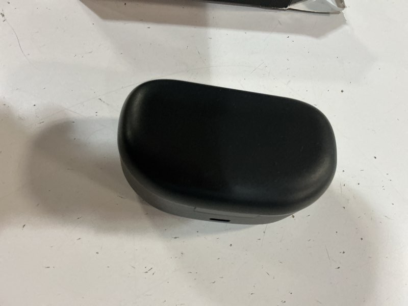 Condition photo showing Good Condition for wireless sport earphones with black charging case