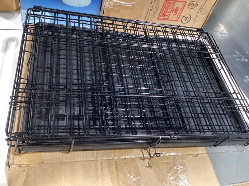 Condition photo showing Good Condition for sweetcrispy 24 inch single door dog crate, metal pet kennel with secure lock, foldable design, removable tray for easy cleaning, portable puppy cage for small dogs, ideal for training & travel single door 24.4"l x 16.8"w x 18.5"h