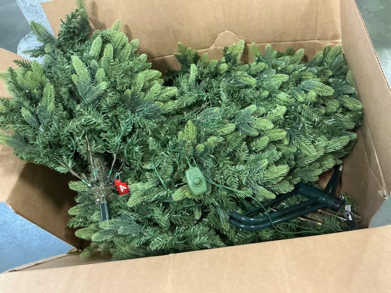 Condition photo showing As Is for National Tree Company 7.5 ft Pre-Lit Dunhill Fir Artificial Christmas Tree, 750 Clear Lights, 2,514 Tips, Includes Stand, Green