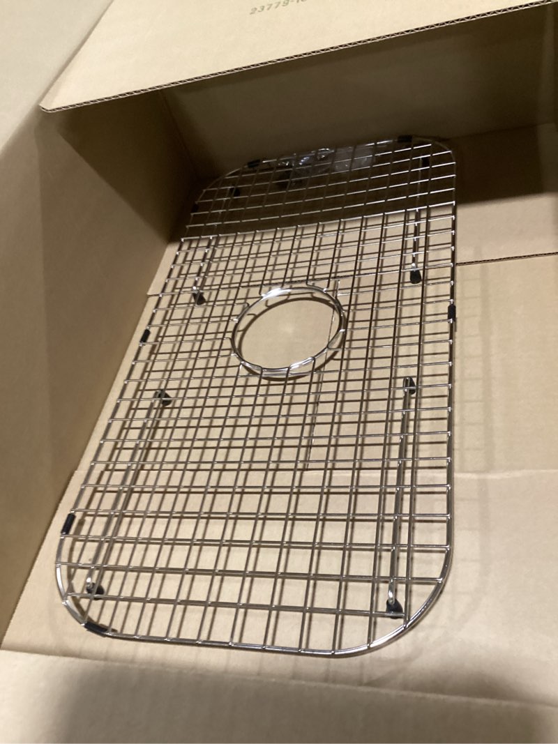 Condition photo showing New/Like New for serene valley sink grid 26-1/8" x 13-15/16", centered drain with corner radius 2-1/2", ndg2614c inches
