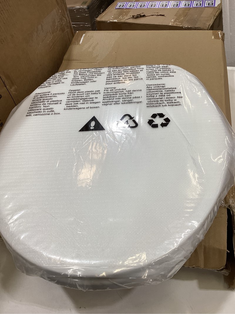 Condition photo showing New/Like New for toilet seat