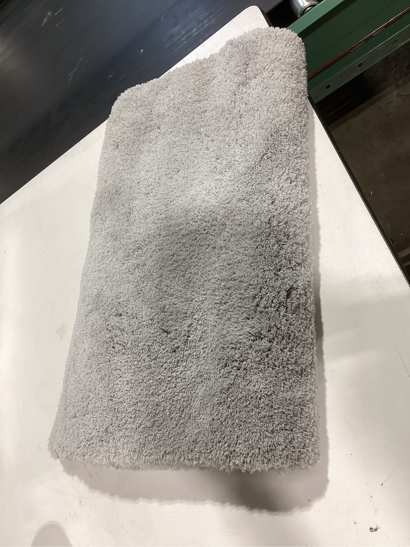 Condition photo showing New/Like New for allen + roth 24-in x 60-in grey silver polyester bath rug