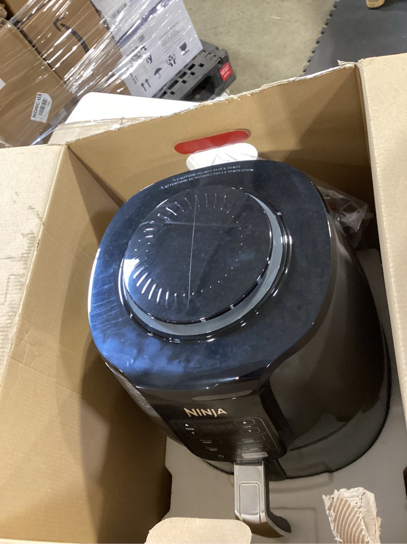 Condition photo showing Good Condition for ninja air fryer | 4 qt capacity | 4-in-1 roast, crisp, roast, reheats, & dehydrates | dishwasher safe parts | 105°f-400°f | includes 20 easy & healthy recipes | 1550 watt | grey | af101