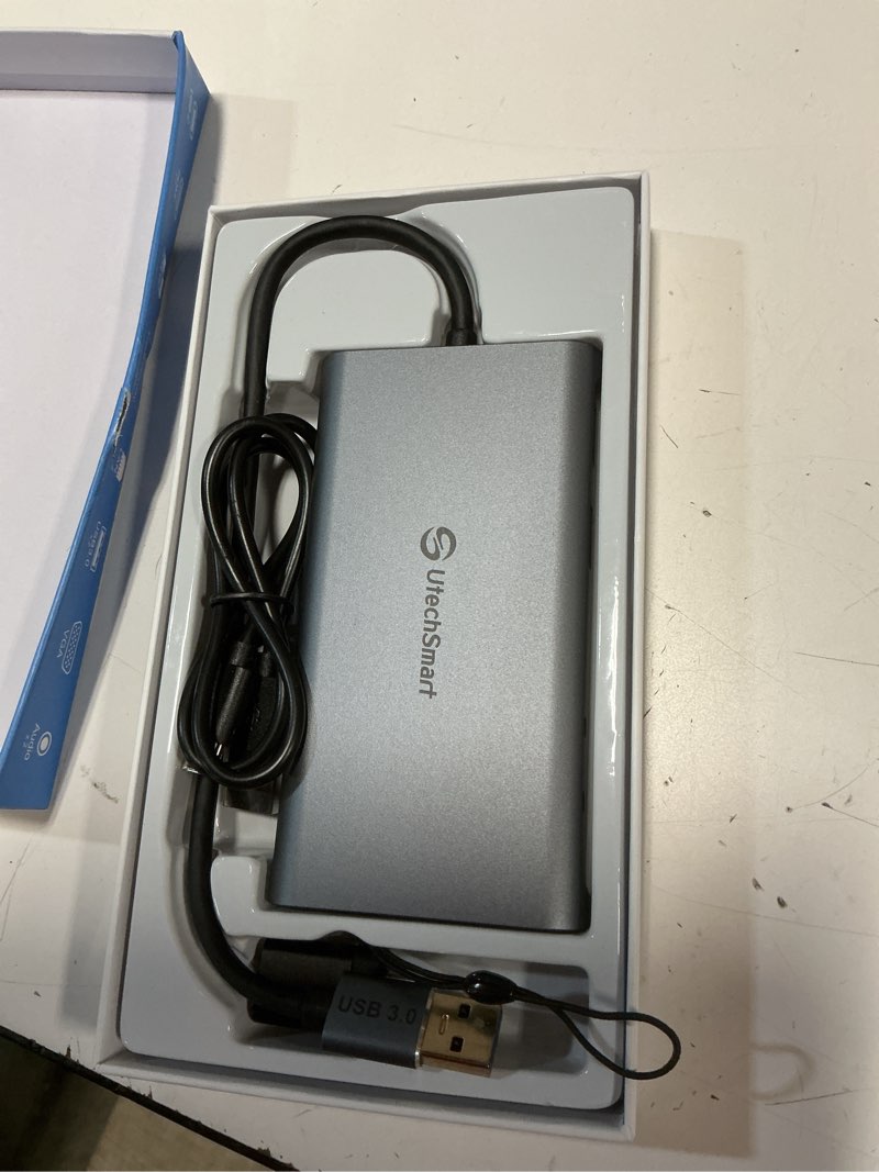 Condition photo showing Good Condition for utechsmart usb docking station, 11 in 1 usb c dock triple display, usb 3.0 laptop docking station with dual hdmi, vga, pd, ethernet, sd/tf, usb 3.0, mic/audio, compatible for macbook m1 dell hp lenovo grey