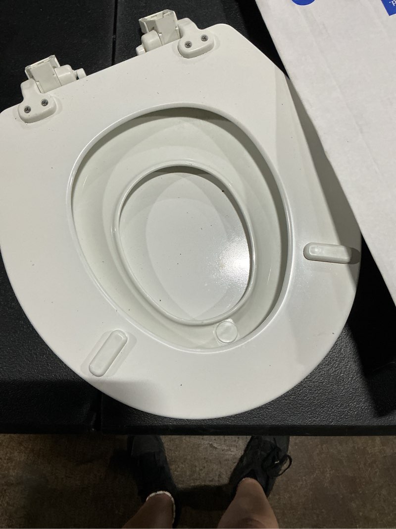 Condition photo showing As Is for mayfair by bemis nextstep2 wood white round soft close toilet seat