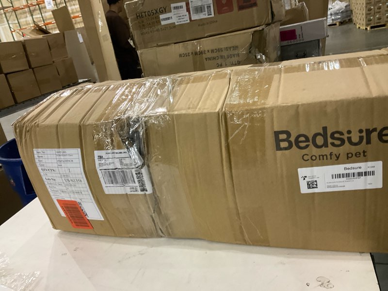 Condition photo showing New/Like New for Bedsure Calming Dog Bed for Extra Large Dogs - Donut Washable Large Pet Bed, 45 inches Anti-Slip Round Fluffy Plush Faux Fur Dog Bed, Fits up to 120 lbs Pets, Black 45"L x 45"W x 10"Th Black