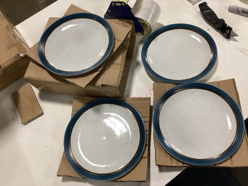 Condition photo showing New/Like New for pfaltzgraff ezra blue 4pc saucers 