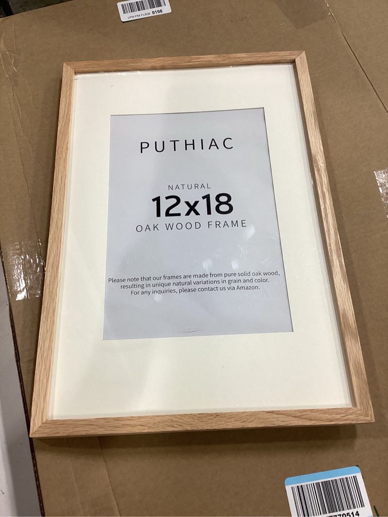 Condition photo showing New/Like New for 12x18 Oak Wood Picture Frame - Minimalist 12x18 Poster Frame, 12"x18" Picture Frame Wood, Natural Solid Wooden Picture Frames for Wall Art Photo and Prints(1 Pack, Beige) Beige-1P 12x18