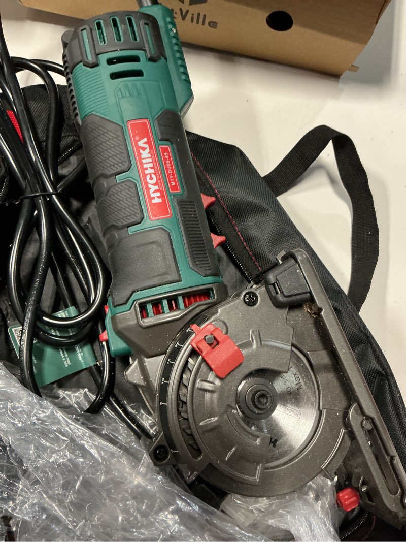 Condition photo showing As Is for hychika mini circular saw, compact with 3 blades 4a pure copper motor, scale ruler, 3-3/8”4500rpm ideal for wood, soft metal and plastic cuts green