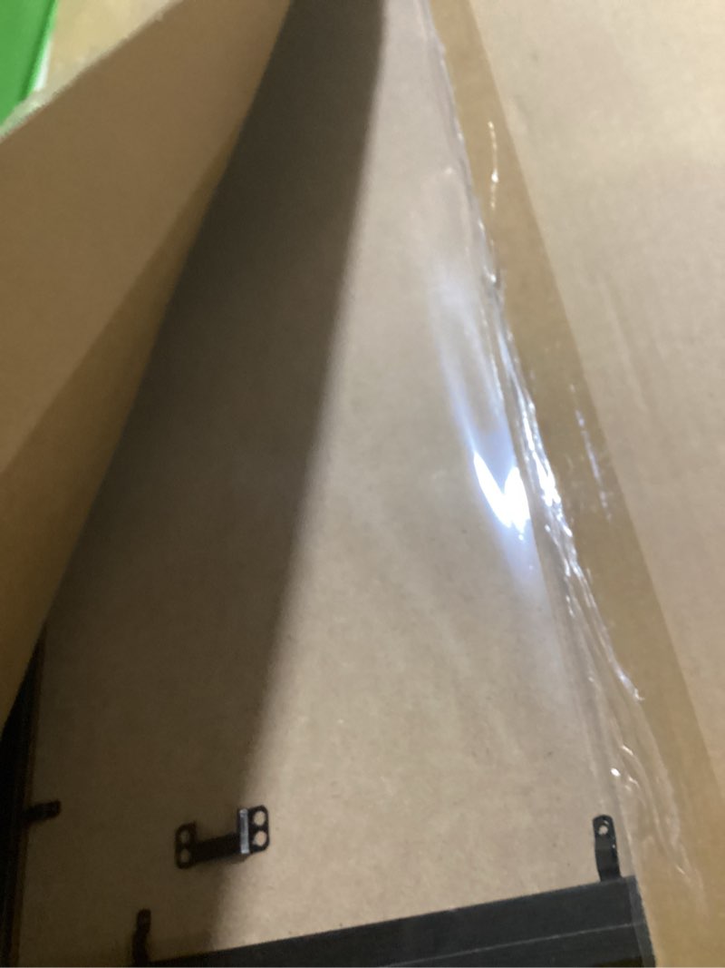Condition photo showing New/Like New for mcs studio gallery 20x27 poster frame black woodgrain engineered wood, vertical & horizontal wall hanging large picture frame for photos, posters & art prints (1-pack) 1-pack black woodgrain 20x27