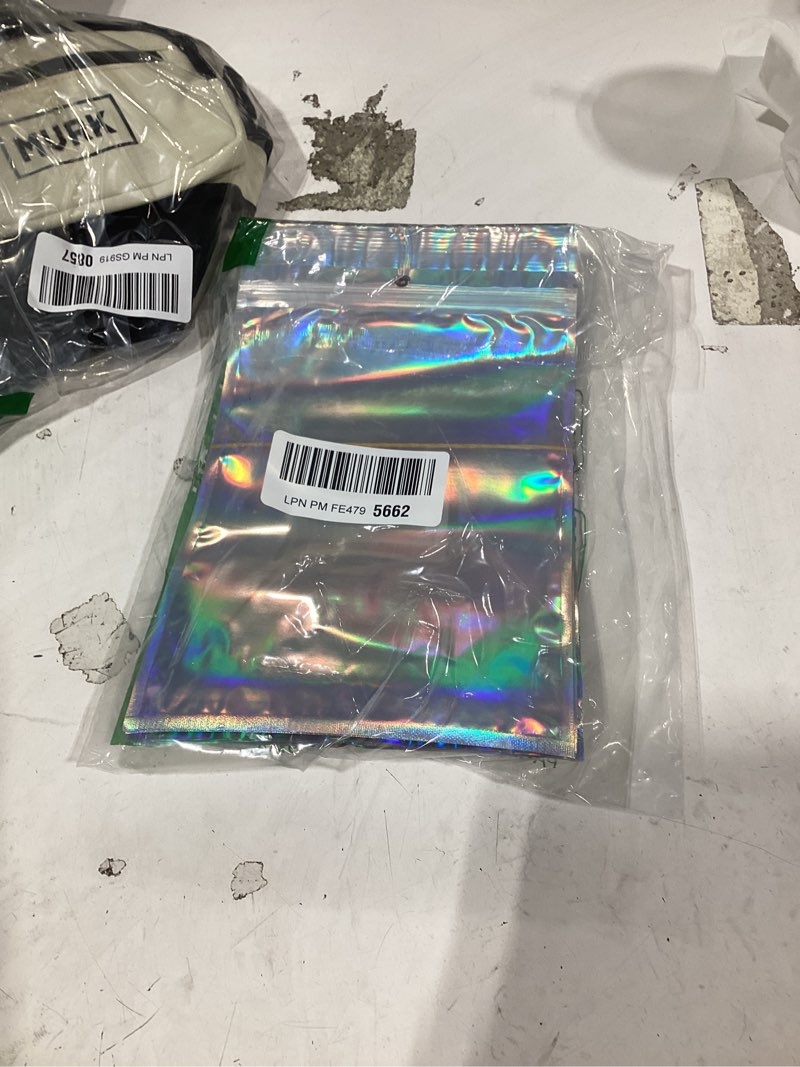 Condition photo showing As Is for funfery 6.3x9.4in smell proof holographic resealable bags,mylar foil bags with zipper,iridescent party favor bag for goodies,candy,treat,clear packaging bag for food storage,business supplies-50pcs | smell proof, resealable zipper, holographic, clear window holographic 6.3x9.4 inch(50pack)