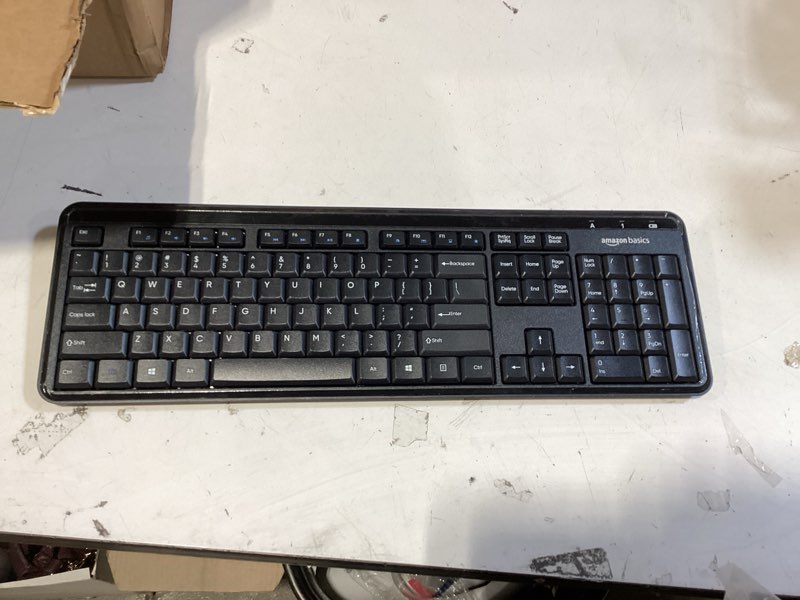 Condition photo showing As Is for amazon basics modern wireless keyboard with numeric keypad, easy setup, plug-and-play, compact us layout (qwerty), 2.4ghz, black