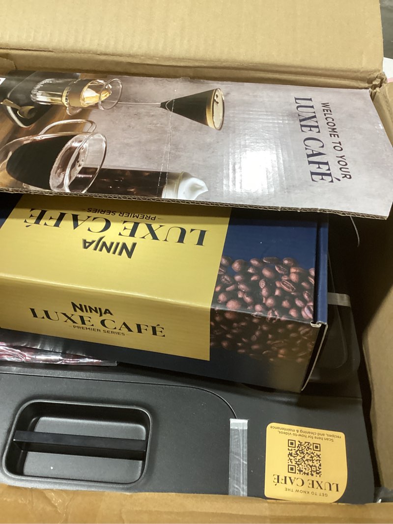 Condition photo showing New/Like New for Ninja Luxe Café 3-in-1 Espresso, Drip Coffee and Cold Brew Machine | Integrated Coffee Grinder, Milk Frother, Assisted Tamper & Built-In Espresso Accessory Storage | Stainless Steel | ES601 Luxe Cafe Stainless Steel