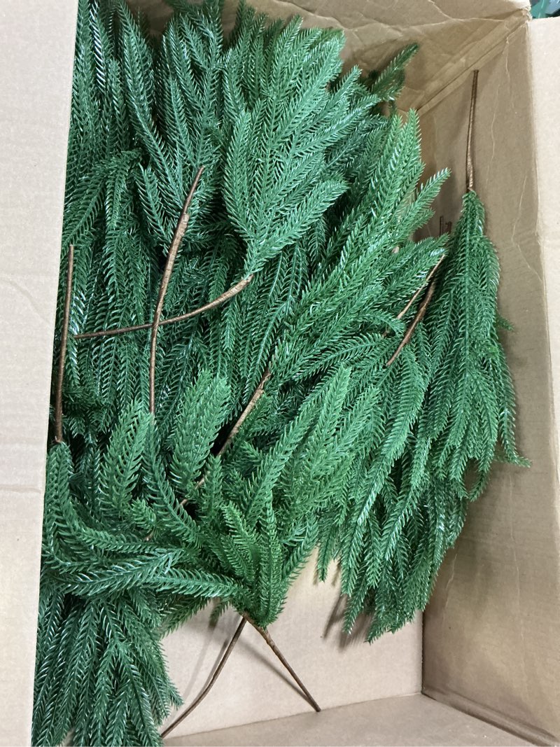 Condition photo showing As Is for Caffox 8 Pcs Artificial Norfolk Pine Stems, 36" Real Touch Norfolk Pine Branches, Greenery Stems for Christmas Decorations