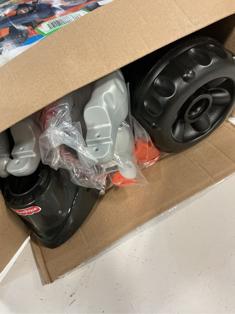 Condition photo showing Good Condition for Fisher-Price Toddler Tricycle Harley-Davidson Tough Trike, Toy Bike with Handlebar Grips & Storage for Outdoor Play Kids Ages 2+ Years (Amazon Exclusive) Harley - Davidson