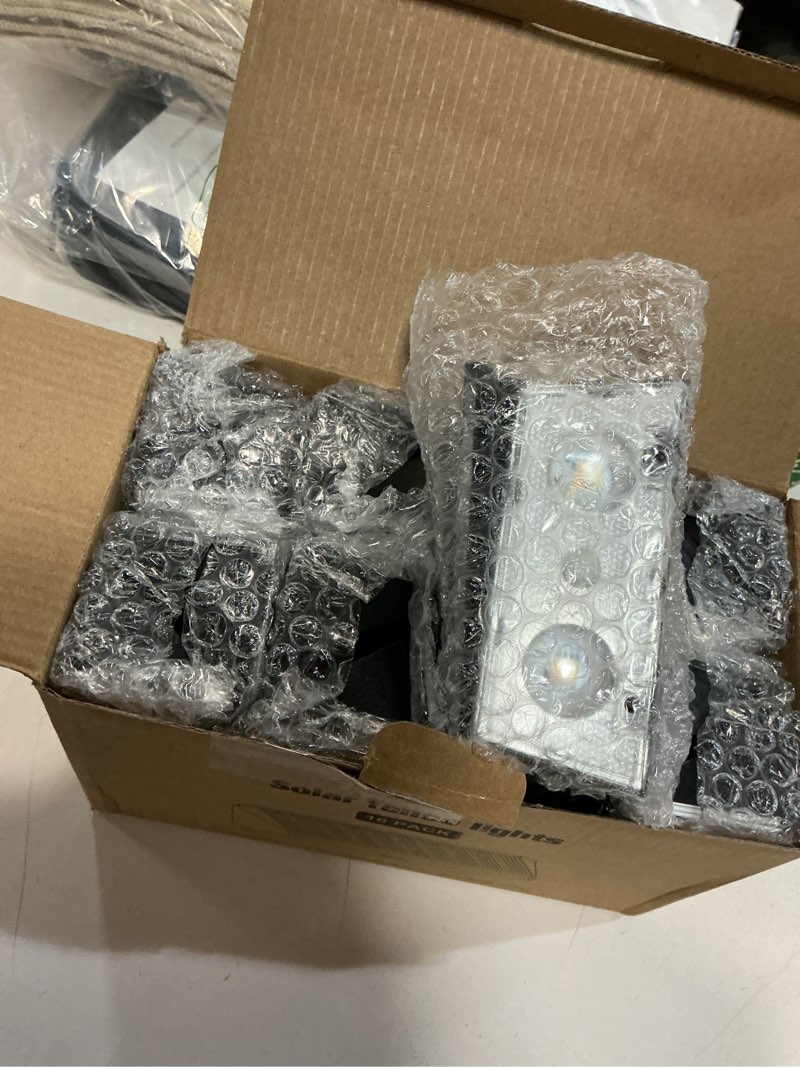 Condition photo showing Good Condition for Solar Fence Lights Outdoor, 16 Pack IP65 Waterproof Fence Lights Solar Powered with Ultra-Bright LED Lens, 9 Color Modes, 12+ Hours Steady Glow for Deck/Backyard/Patio/Pool/Wall - Black Black 16 Pack