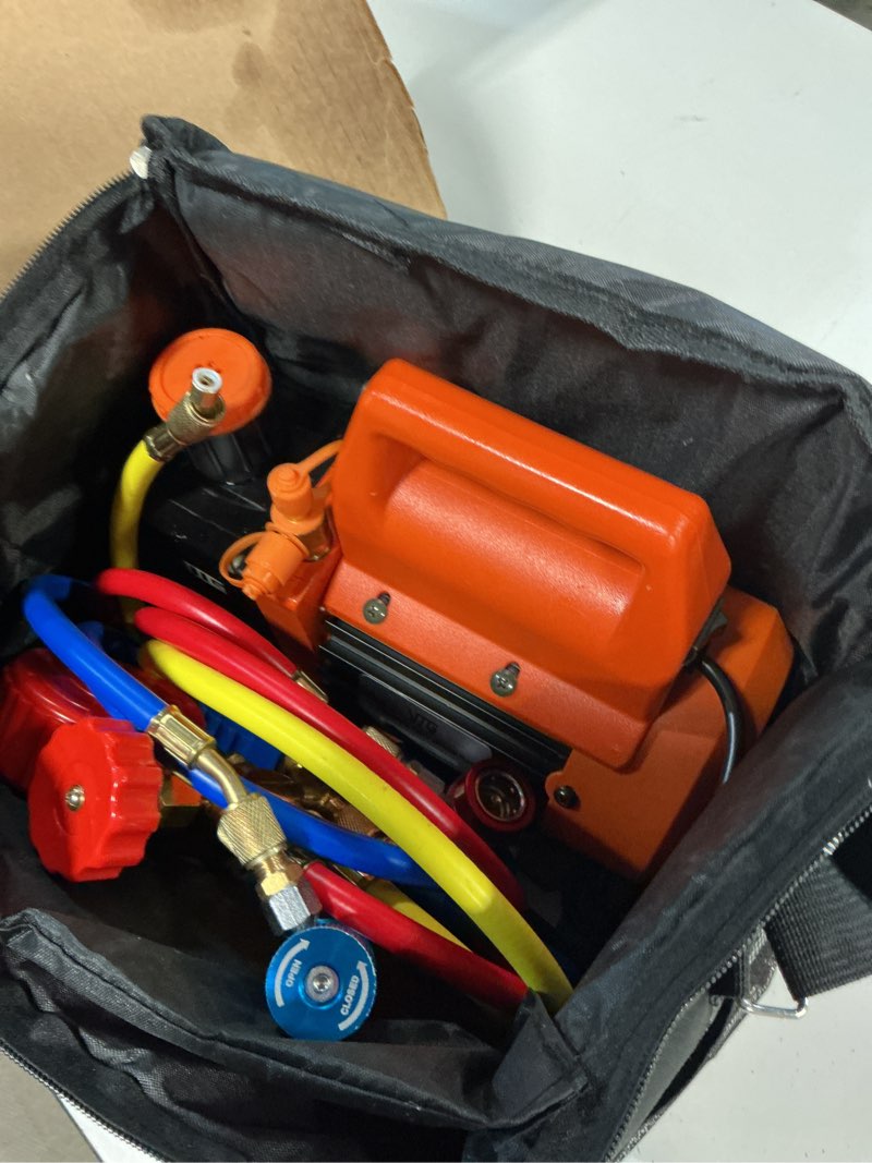 Condition photo showing As Is for vtg vogten 4.5 cfm ac vacuum pump and gauge set,for mini split/hvac/auto systems,manifold gauge kit compatible with r134a r12 r22 r502,includes 2 r134a can taps,r410a adapters
