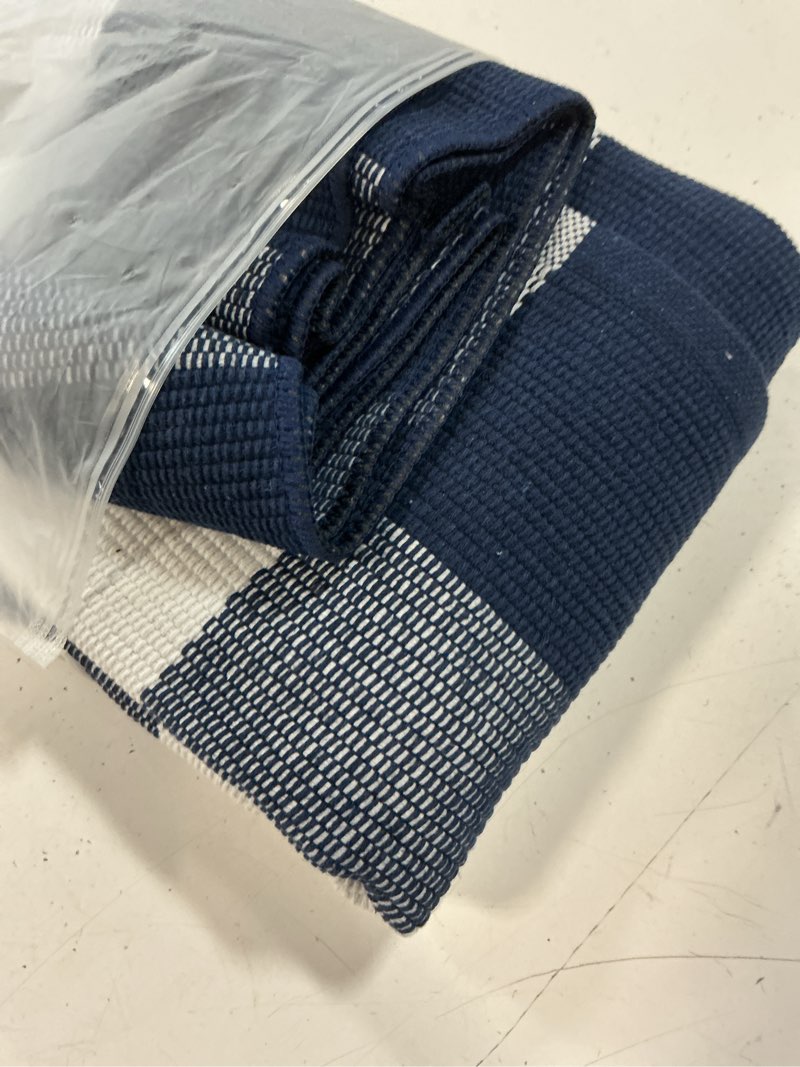 Condition photo showing Good Condition for mubin cotton buffalo plaid rug, 3' x 5' navy blue white outdoor rug front door decorative mat, washable doormat foldable area rug layered door mats rug for front porch, entryway, patio navy blue white plaid 3' x 5' (rectangular)