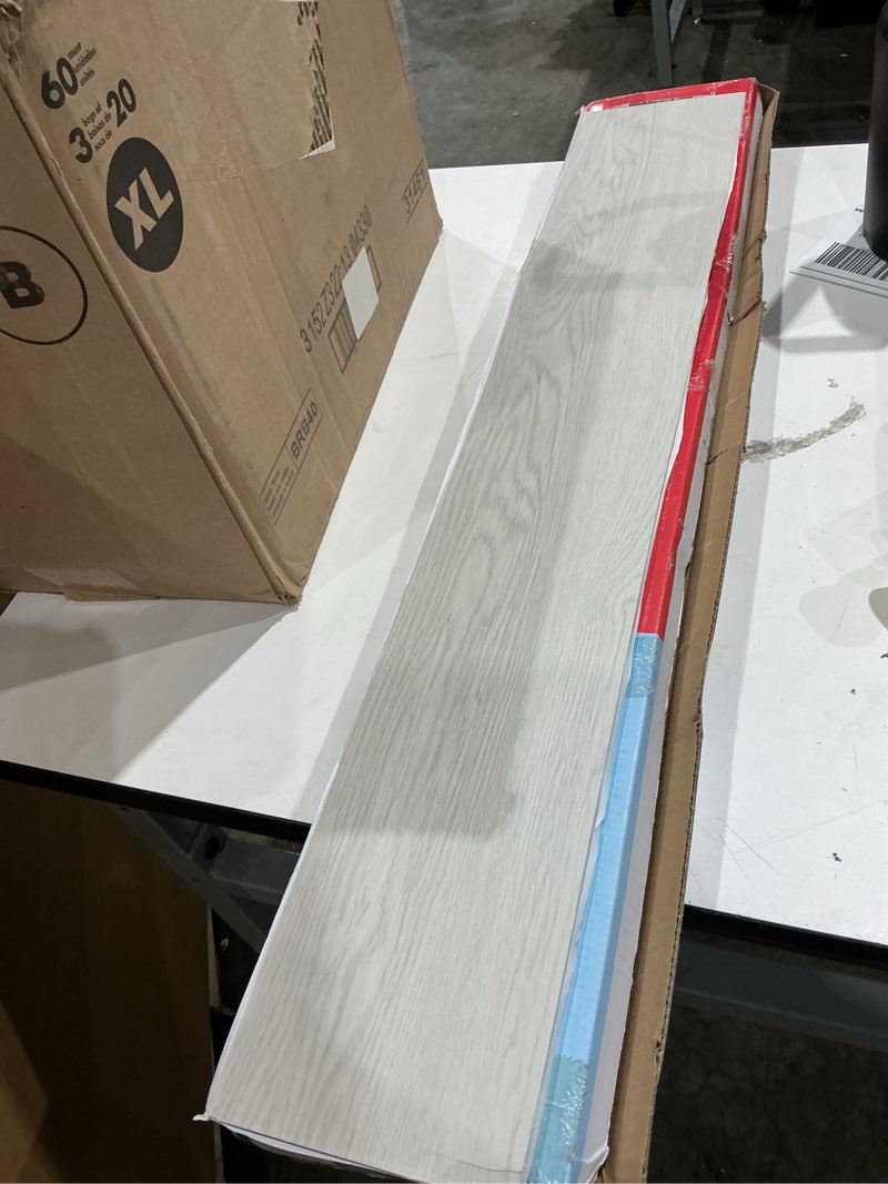 Condition photo showing Good Condition for lucida surfaces basecore 6x36in 12mil 2mm 18sqft peel and stick lvp box of 12 planks cotton 12