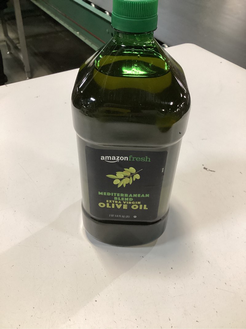 Condition photo showing item condition for Amazon Fresh, Mediterranean Blend Extra Virgin Olive Oil, 2QT 3.6 Fl Oz (2L) Mediterranean 67.6 Ounce