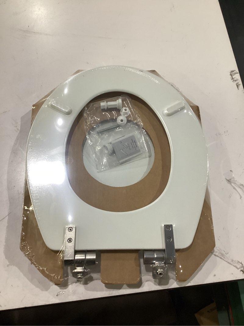 Condition photo showing New/Like New for mayfair bennett toilet seat with brushed nickel hinges, slow close wood seat, secure metal hinges, easy install, made in usa, round, white round brushed nickel