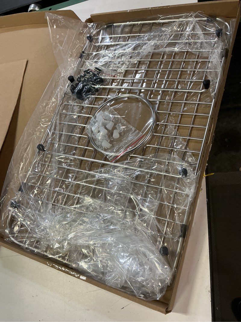 Condition photo showing Good Condition for serene valley sink bottom grid 21" x 12-7/8", centered drain with corner radius 2", svm2113c