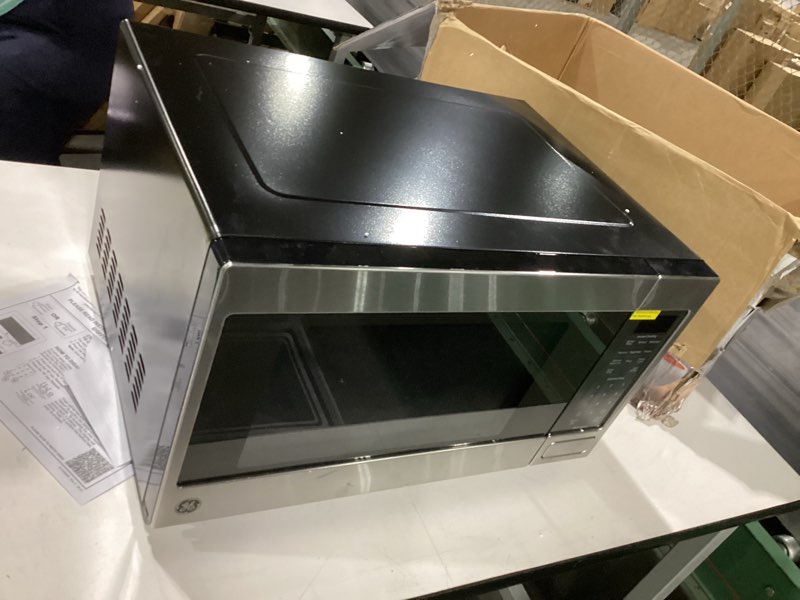 Condition photo showing Good Condition for ge countertop microwave oven, 1,150-watt capacity, 1.6 cubic ft., 8 auto setting cooking settings, child-lock technology, kitchen essentials for the countertop, dorm room or apartment, stainless steel 1.6 cu.ft. stainless steel