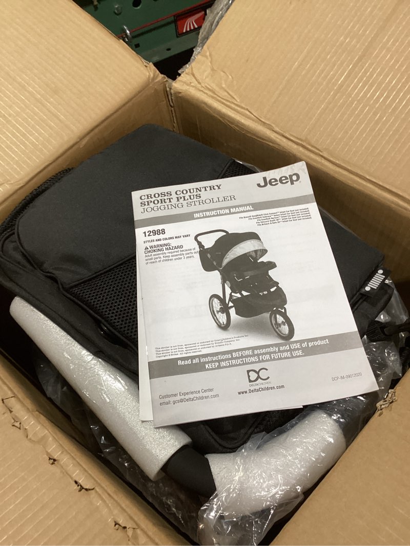 Condition photo showing New/Like New for jeep cross-country sport plus jogging stroller by delta children, charcoal galaxy